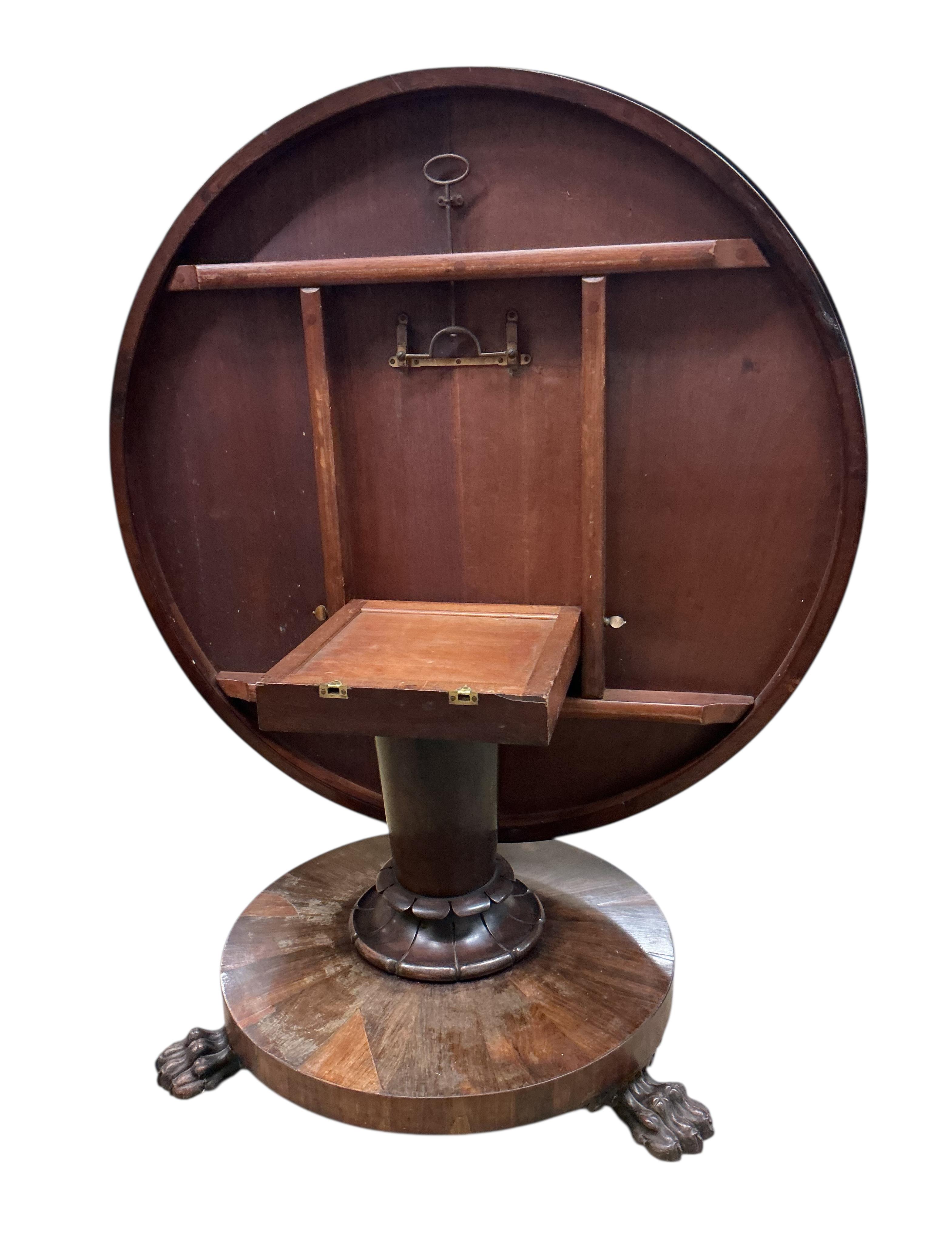 An early Victorian circular rosewood tilt top breakfast table, diameter 128cm, height 72cm
